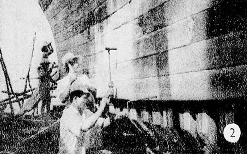 Archive photograph of workers at a shipyard in Sulawesi, published January 1944